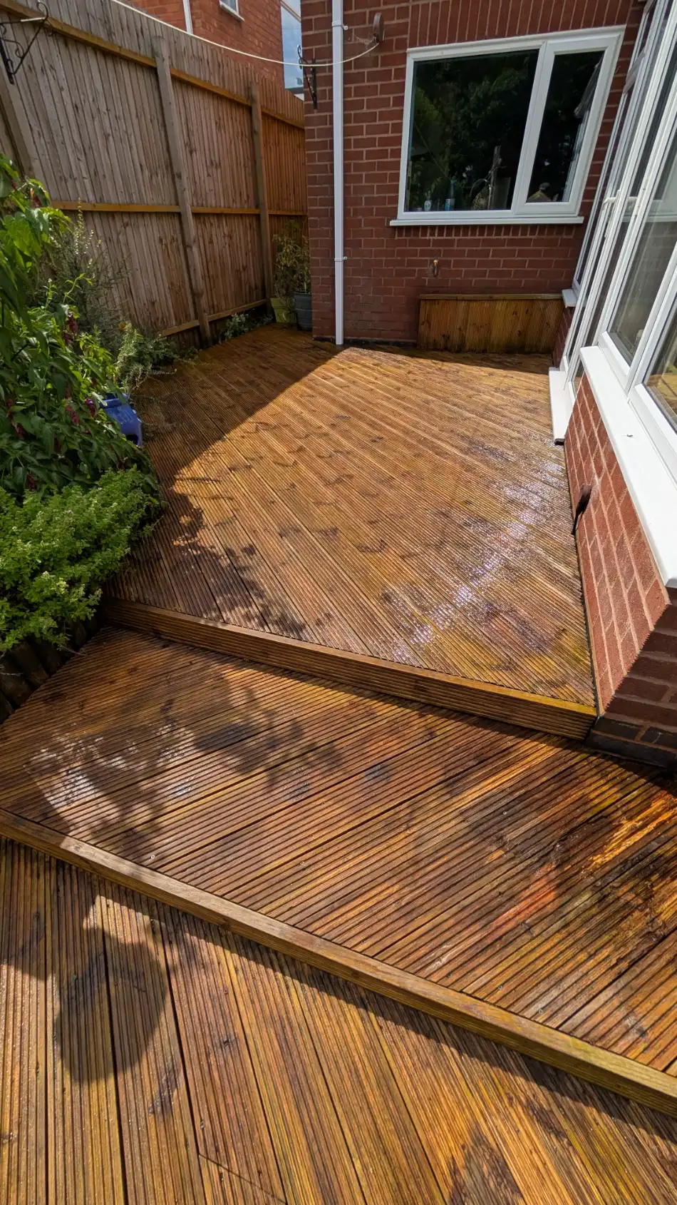 Same timber garden decking after cleaning