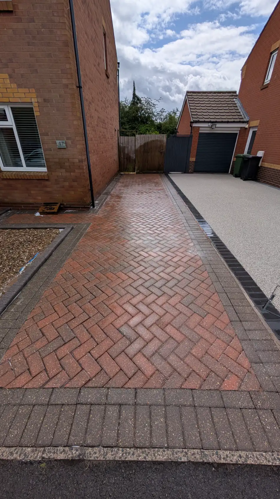 Same block-paved driveway and side path after cleaning