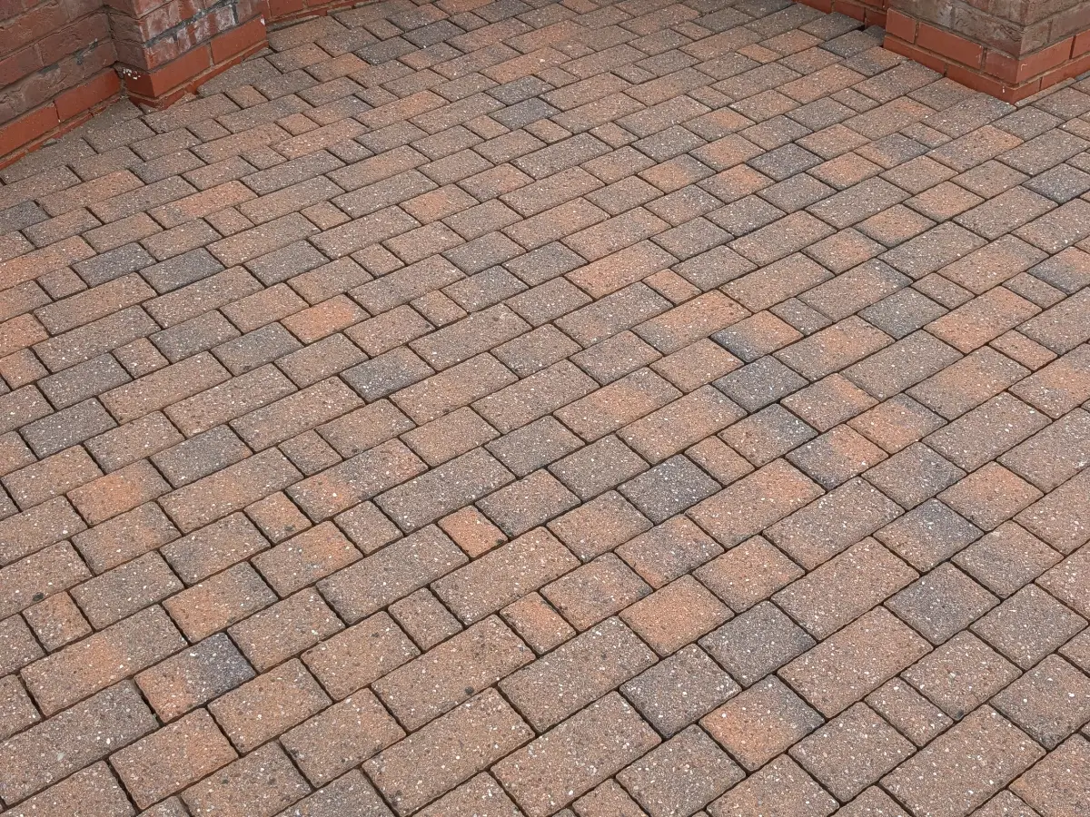 The same block paving courtyard, weeds and moss removed, after Restorra cleaning