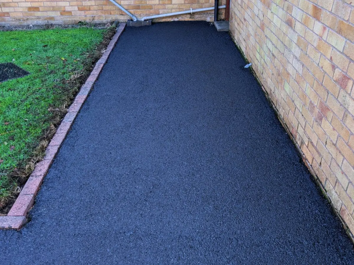 The same tarmac path after Restorra cleaning