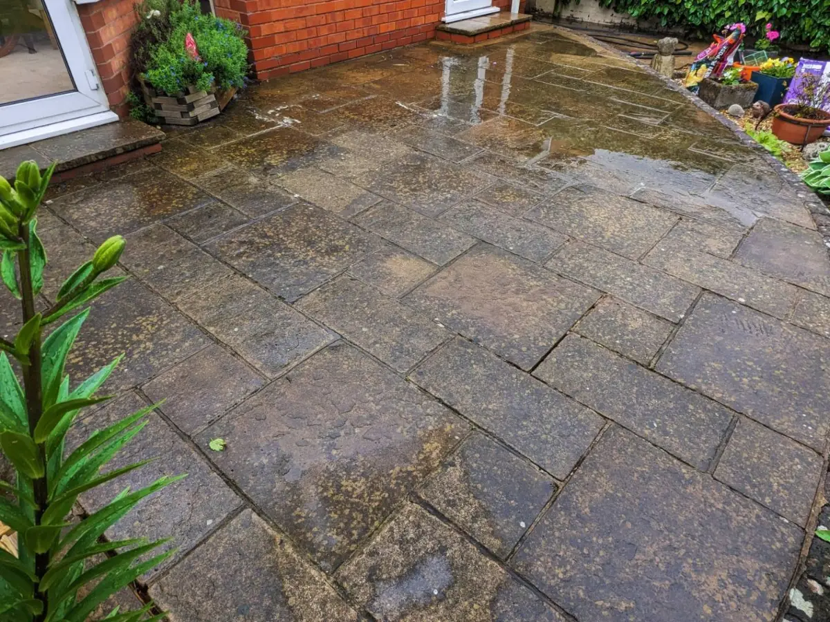 Weathered rear patio before Restorra cleaning