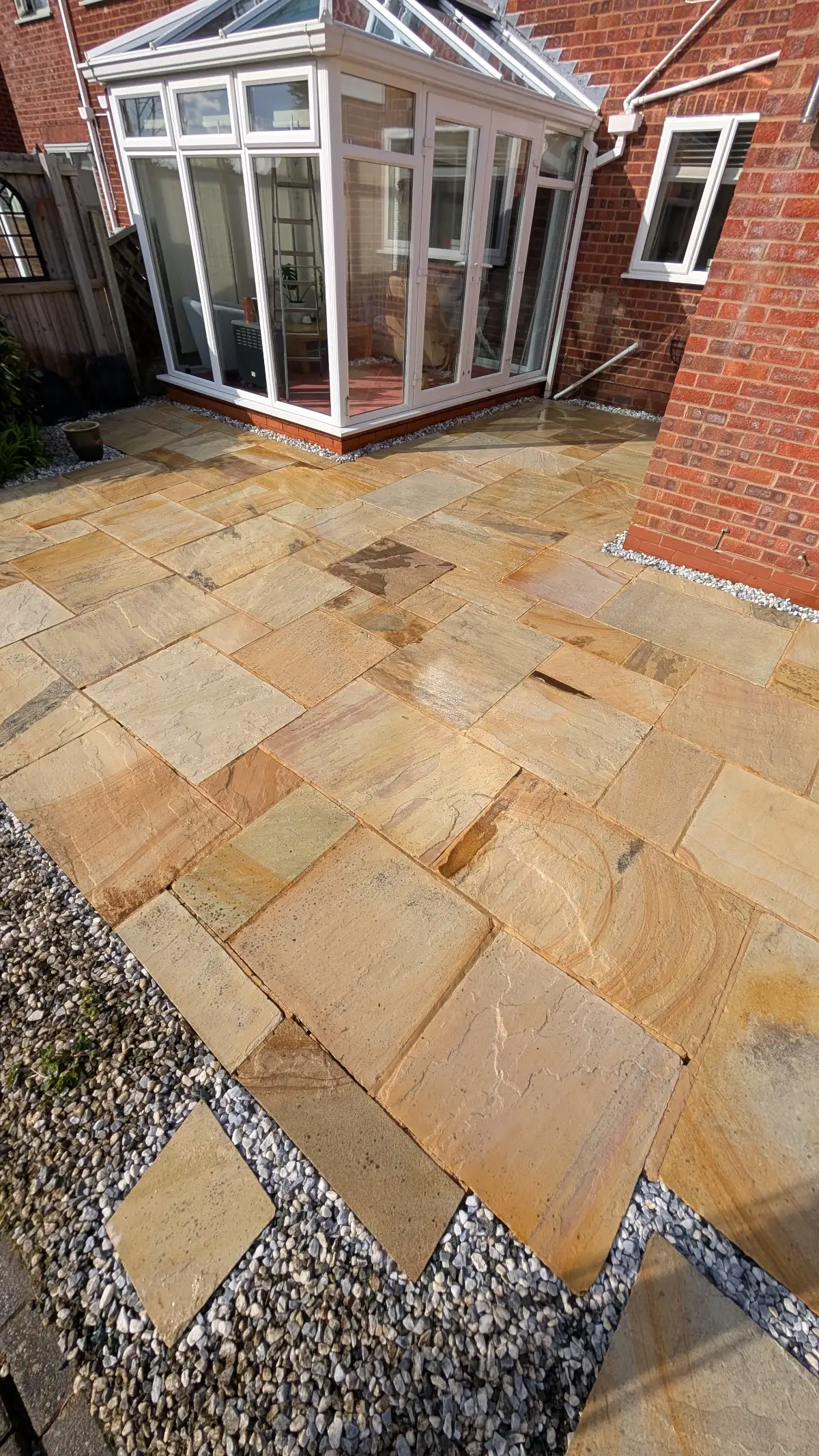 Same Indian sandstone patio in Penwortham after cleaning