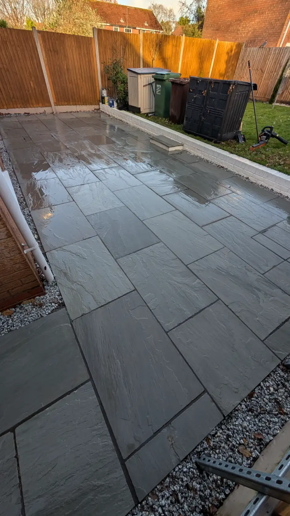 Same patio paving slabs after cleaning