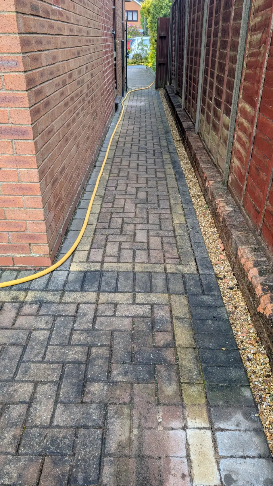 Block-paved side path in Buckshaw Village before pressure washing